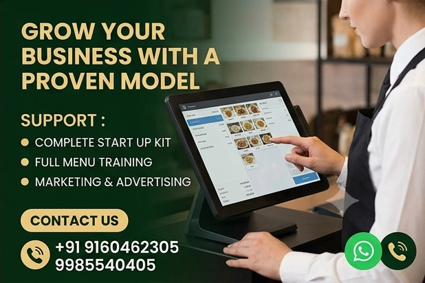 Rolex Cafe support team member using a point-of-sale system, representing training and marketing support